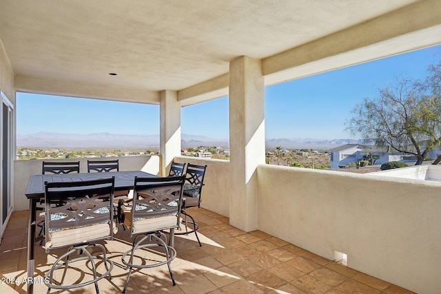 balcony featuring a mountain view