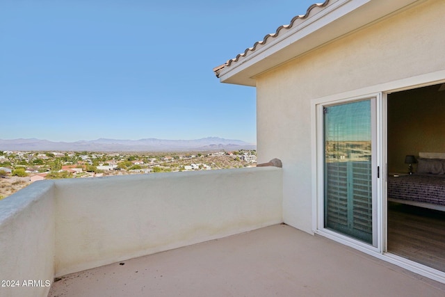 balcony featuring a mountain view