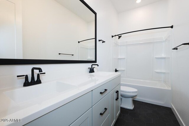 full bathroom featuring shower / bath combination, vanity, toilet, and tile patterned floors