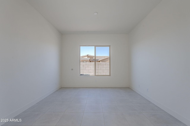 empty room featuring light tile patterned flooring