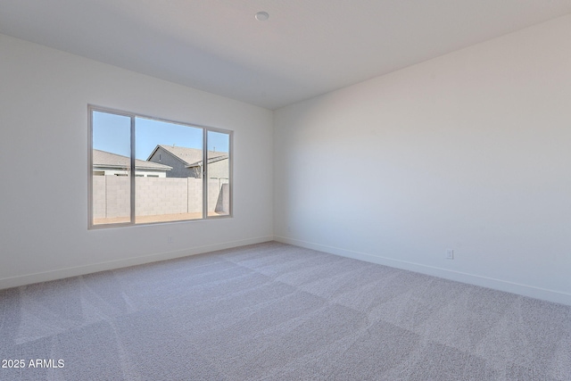 empty room featuring carpet floors