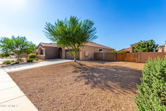 10542 W Electra Ln, Peoria, AZ 85383 - view of front of property featuring stucco siding, an attached garage, concrete driveway, and a tile roof