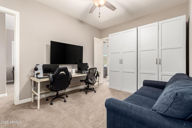 10542 W Electra Ln, Peoria, AZ 85383 - home office with light colored carpet, a ceiling fan, and baseboards