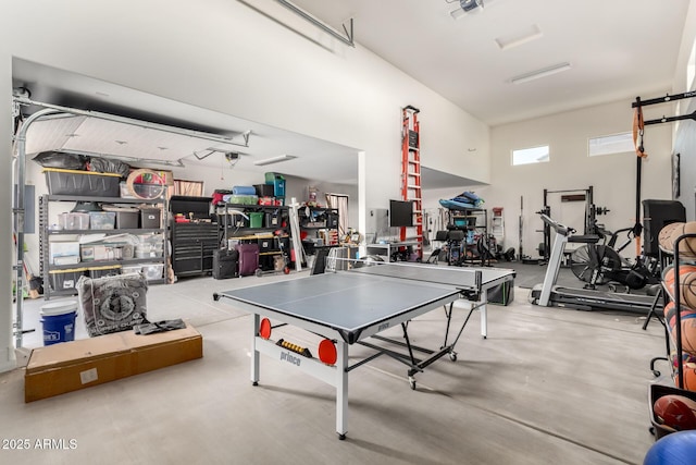 10542 W Electra Ln, Peoria, AZ 85383 - playroom with concrete floors and a garage