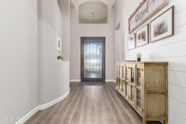 10542 W Electra Ln, Peoria, AZ 85383 - foyer entrance with baseboards, wood finished floors, and a high ceiling