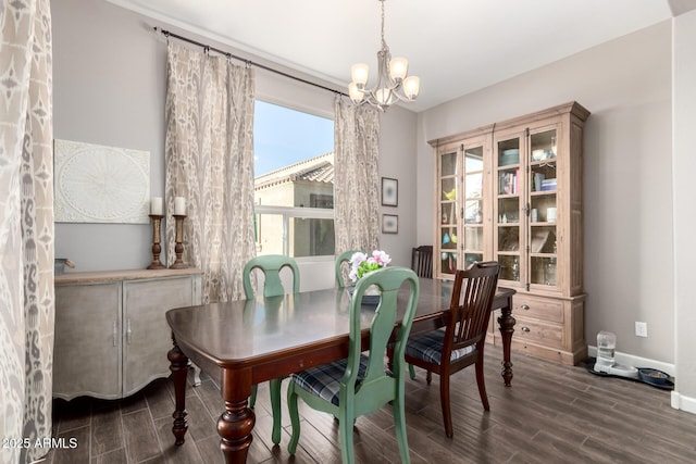 10542 W Electra Ln, Peoria, AZ 85383 - dining area with a chandelier, wood finish floors, and baseboards
