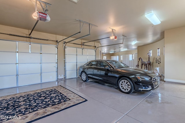 garage featuring a garage door opener