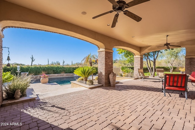 view of patio with ceiling fan