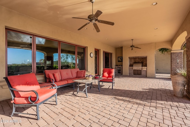 view of patio with an outdoor kitchen, ceiling fan, an outdoor hangout area, and grilling area