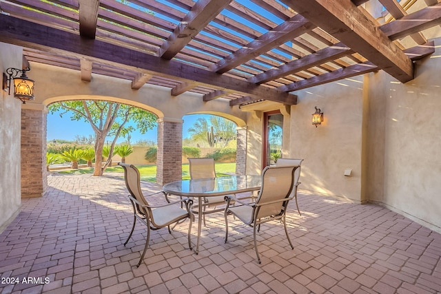 view of patio featuring a pergola