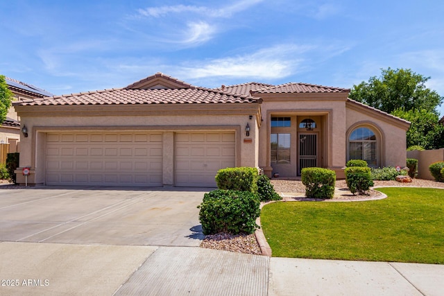 7231 W Lone Cactus Dr, Glendale, AZ 85308 - view of front facade with an attached garage, concrete driveway, stucco siding, and a front lawn