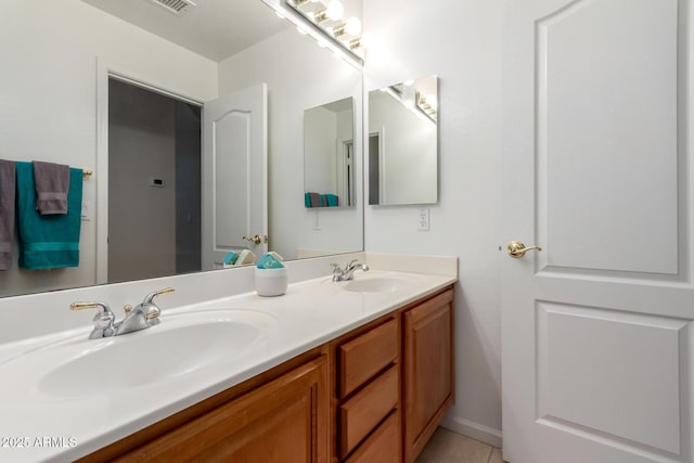 7231 W Lone Cactus Dr, Glendale, AZ 85308 - bathroom with double vanity and tile patterned floors