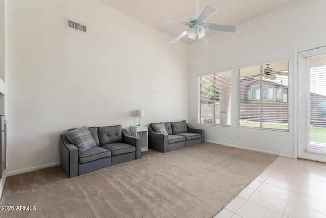 7231 W Lone Cactus Dr, Glendale, AZ 85308 - sitting room featuring ceiling fan, high vaulted ceiling, carpet floors, baseboards, and tile patterned flooring
