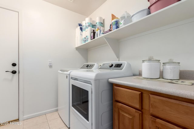 7231 W Lone Cactus Dr, Glendale, AZ 85308 - laundry area featuring washing machine and dryer, light tile patterned floors, and baseboards