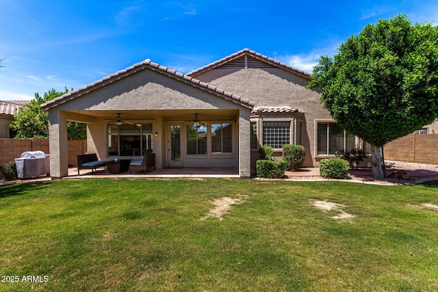 7231 W Lone Cactus Dr, Glendale, AZ 85308 - rear view of property with ceiling fan, a patio area, an outdoor living space, stucco siding, and a tiled roof