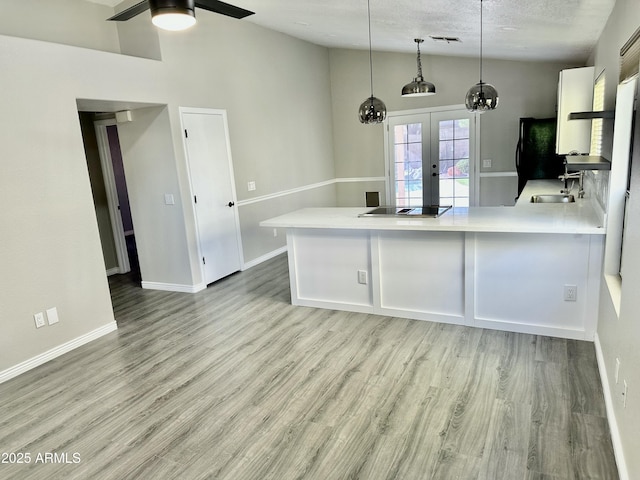 2138 E Williams Dr, Phoenix, AZ 85024 - kitchen featuring vaulted ceiling, french doors, black appliances, light countertops, and ceiling fan