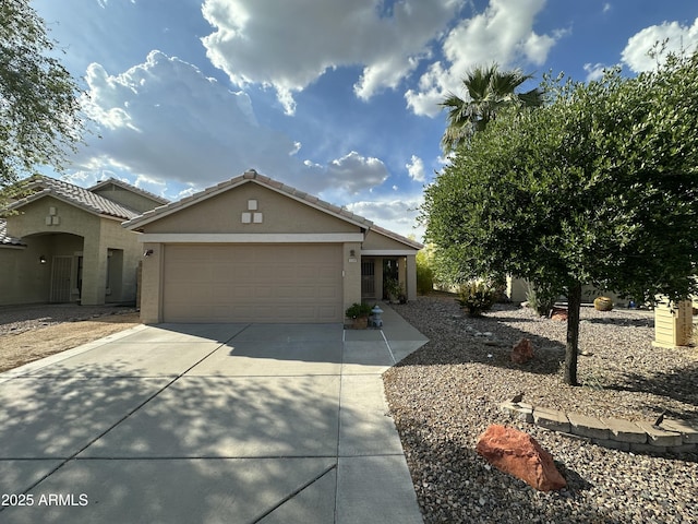 2138 E Williams Dr, Phoenix, AZ 85024 - view of front facade featuring concrete driveway, an attached garage, and stucco siding
