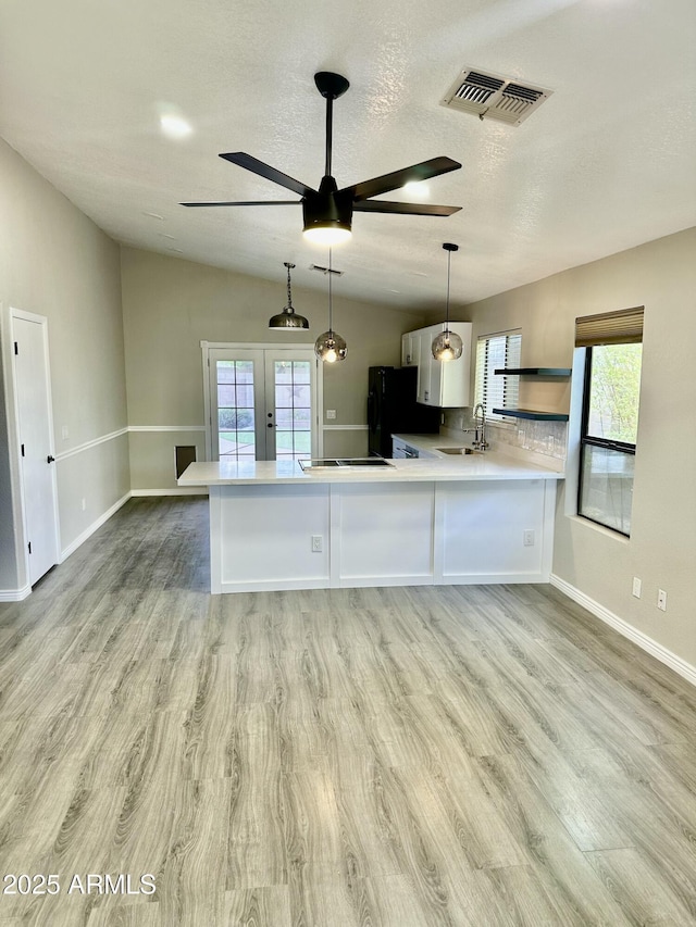 2138 E Williams Dr, Phoenix, AZ 85024 - kitchen featuring a sink, light countertops, ceiling fan, french doors, and healthy amount of natural light