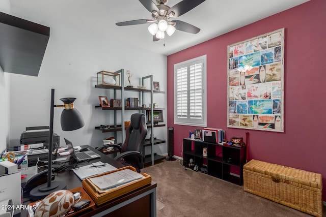 carpeted office with ceiling fan