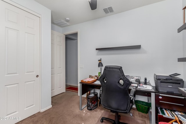 home office featuring ceiling fan and carpet floors