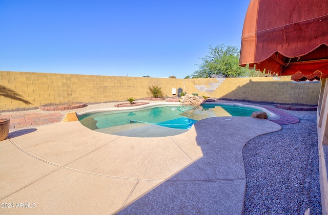 view of pool featuring a patio area