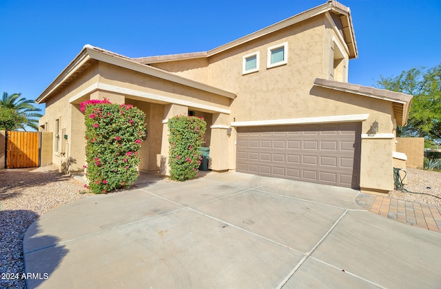 view of front of home with a garage