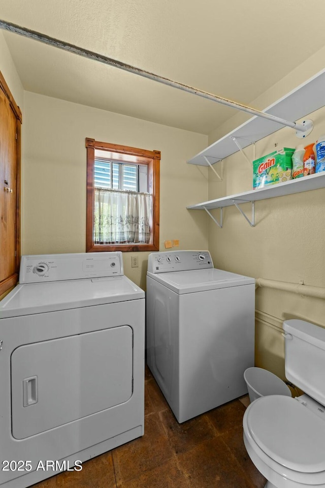 laundry area featuring laundry area and washing machine and clothes dryer