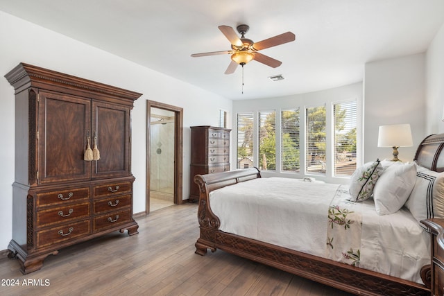 bedroom with ceiling fan and wood-type flooring