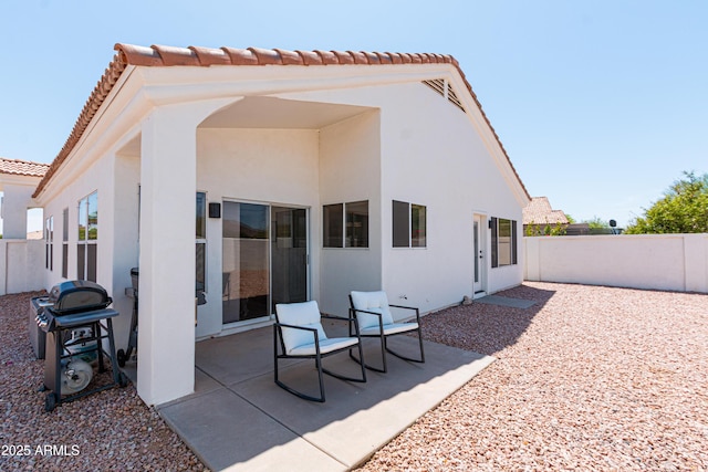 9791 N 118th Way, Scottsdale, AZ 85259 - rear view of house featuring stucco siding, a patio area, and a fenced backyard