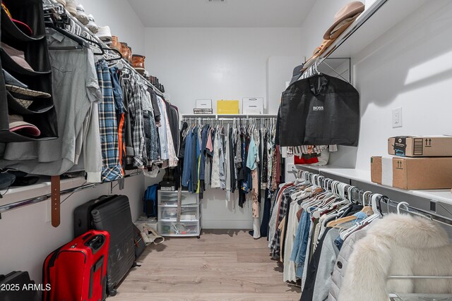 33766 N 86th St, Scottsdale, AZ 85266 - walk in closet featuring wood finished floors