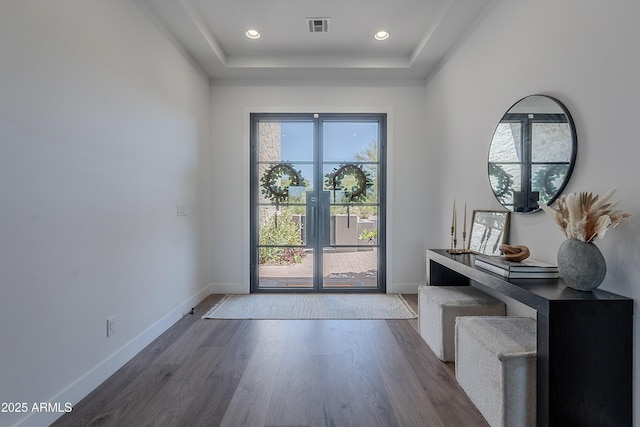 33766 N 86th St, Scottsdale, AZ 85266 - entryway featuring wood finished floors, baseboards, a raised ceiling, and recessed lighting