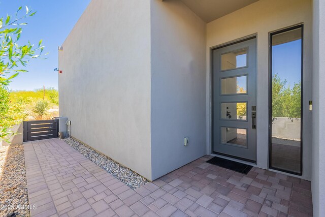 33766 N 86th St, Scottsdale, AZ 85266 - view of exterior entry featuring stucco siding