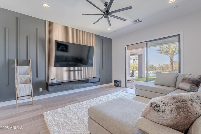 33766 N 86th St, Scottsdale, AZ 85266 - living area with light wood-type flooring, baseboards, a ceiling fan, and recessed lighting