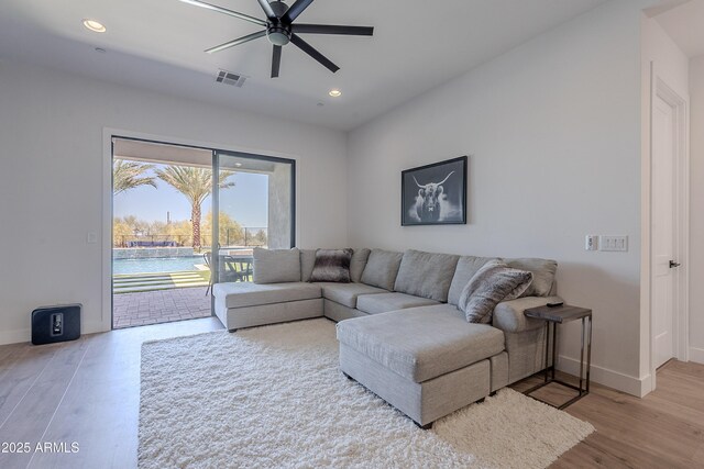 33766 N 86th St, Scottsdale, AZ 85266 - living room featuring a ceiling fan, baseboards, wood finished floors, and recessed lighting