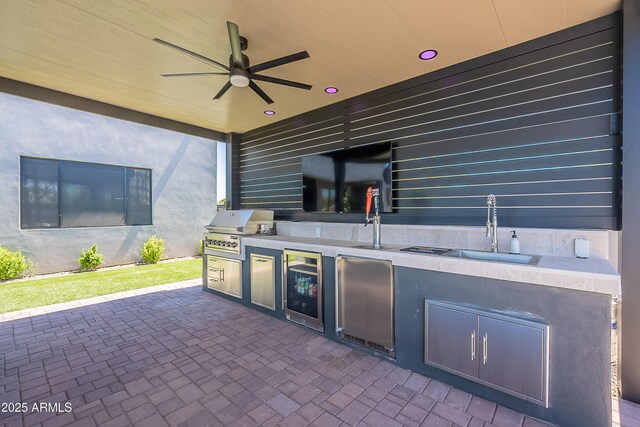 33766 N 86th St, Scottsdale, AZ 85266 - view of patio with a grill, a sink, ceiling fan, an outdoor kitchen, and beverage cooler