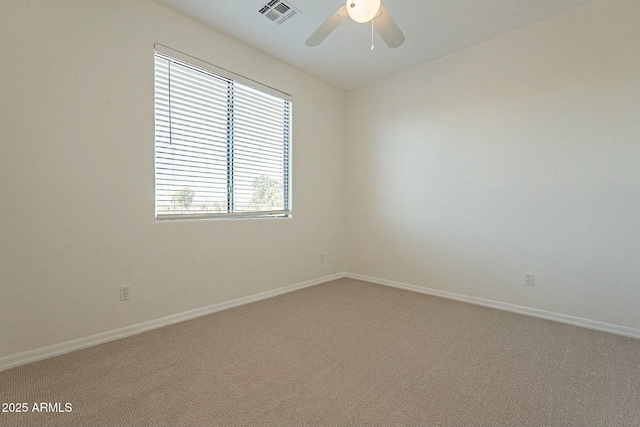 unfurnished room featuring carpet floors and ceiling fan