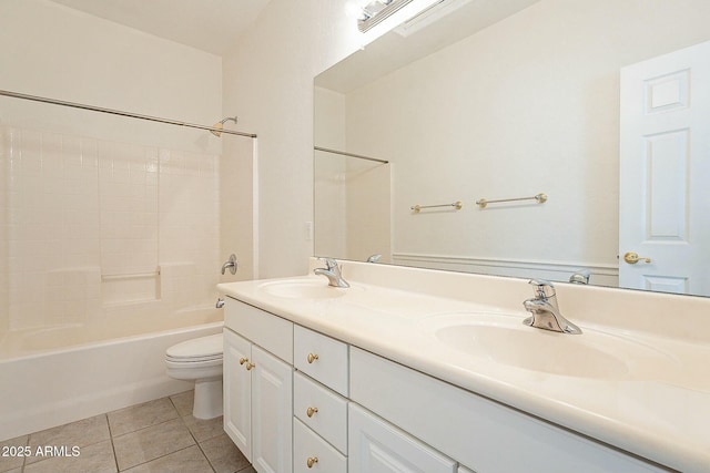 full bathroom featuring toilet, vanity, bathing tub / shower combination, and tile patterned floors