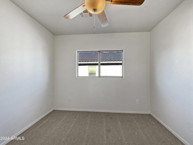 unfurnished room with carpet floors and ceiling fan