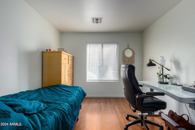 bedroom featuring light wood-type flooring