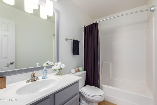 full bathroom featuring tile floors, toilet, shower / bathtub combination with curtain, and vanity