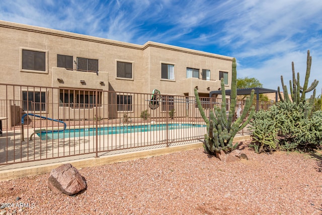 view of swimming pool featuring a patio