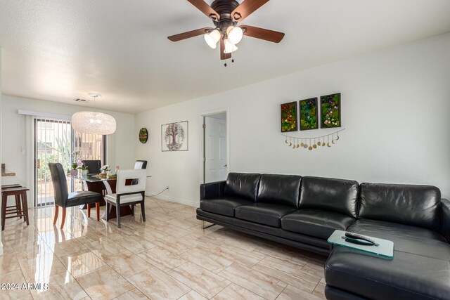 living room with ceiling fan