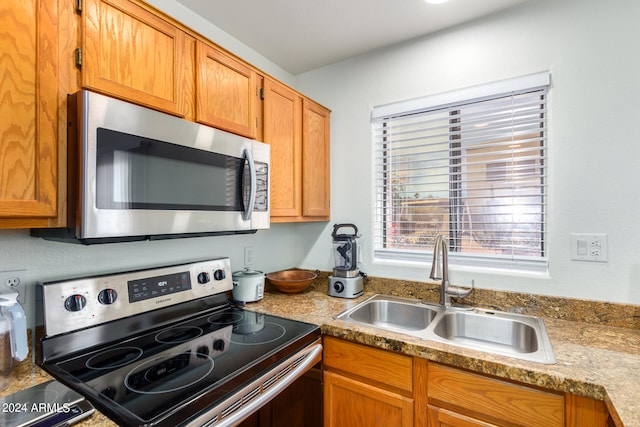 kitchen with sink and stainless steel appliances