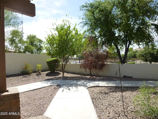 6687 S Banning St, Gilbert, AZ 85298 - fenced backyard with a patio area