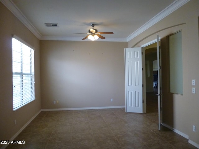 6687 S Banning St, Gilbert, AZ 85298 - spare room with ceiling fan, ornamental molding, baseboards, and arched walkways
