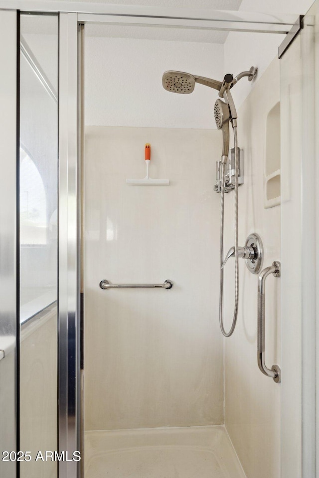 full bathroom with a shower stall