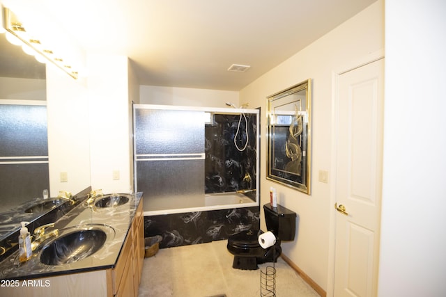 full bathroom featuring toilet, vanity, and bathing tub / shower combination