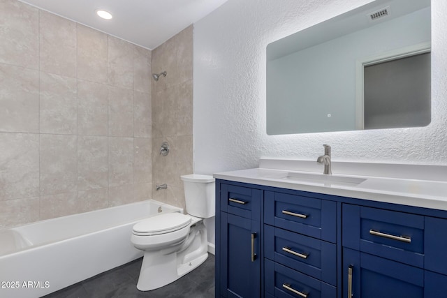 full bathroom featuring visible vents, toilet, tile patterned flooring, tub / shower combination, and vanity