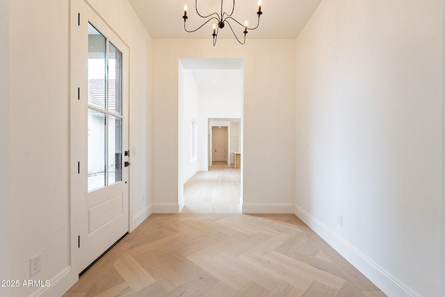 6832 N 178th Ln, Waddell, AZ 85355 - foyer entrance featuring baseboards and a chandelier