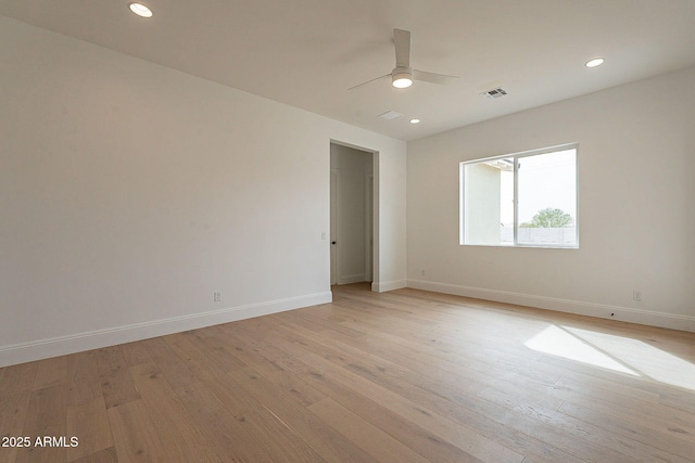 6832 N 178th Ln, Waddell, AZ 85355 - spare room with recessed lighting, light wood-style flooring, a ceiling fan, and baseboards